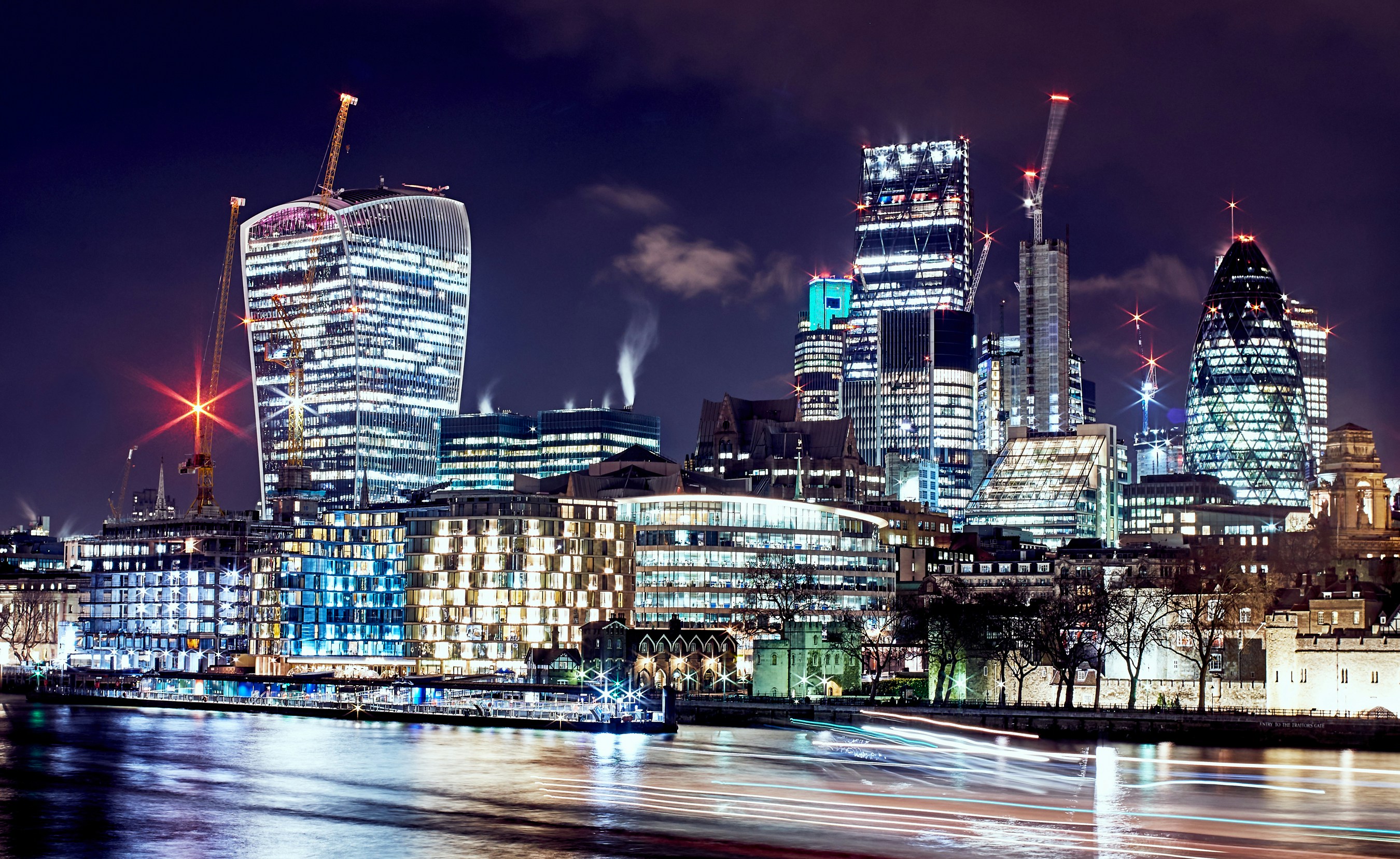 London at night with cranes